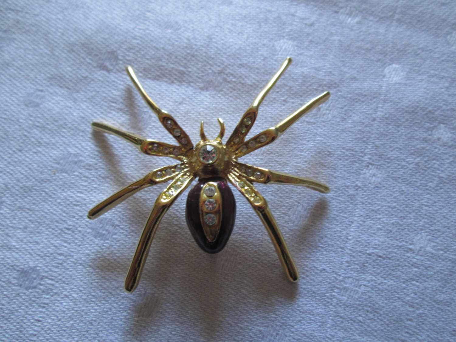 Gold tone spider pin - Gem