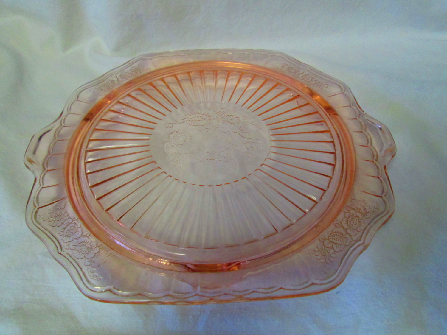Beautiful Pink Glass Depression Glass Cake plate Ribbed with floral pattern...