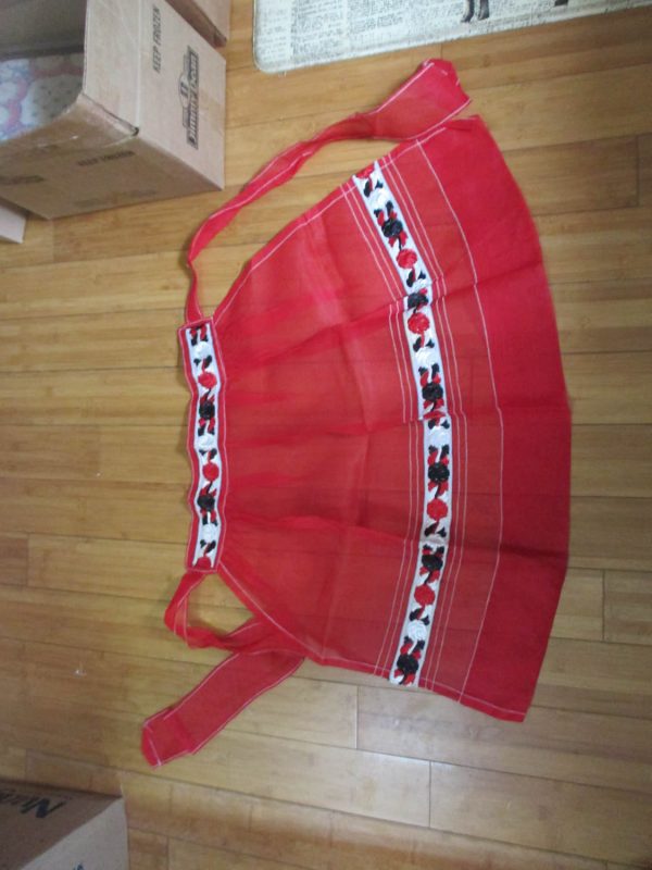 Fantastic New old stock unused Apron Sheer red fabric embroidered at waist and around the bottom