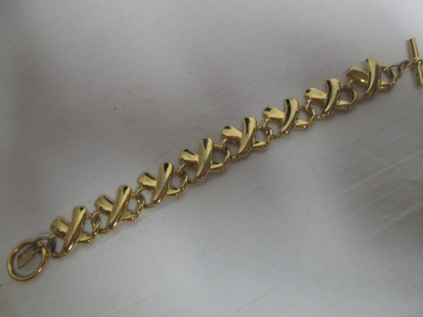 Vintage Anne Klein X Bracelet with Bar and circle Closure Gold tone Great condition signed