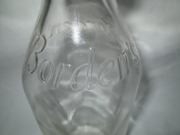 Antique one quart pasteurized milk very Borden's Milk Glass Bottle