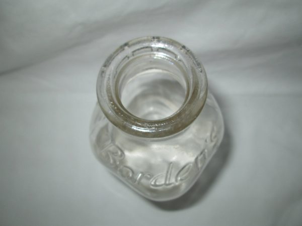 Antique one quart pasteurized milk very Borden's Milk Glass Bottle
