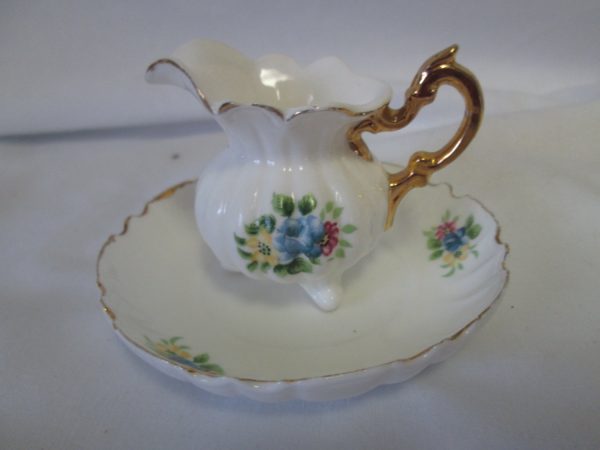 Beautiful Miniatrue pitcher and plate fine bone china floral trimmed in gold Mid century gold handle footed pitcher scalloped plate
