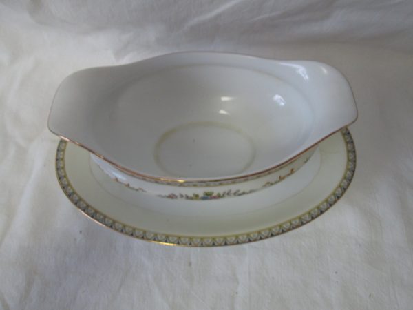 Beautiful Noritake Japan Mid Century Fine Bone China Floral Pattern Gravy Boat plate with small chip on bottom rim 9" long 7" wide
