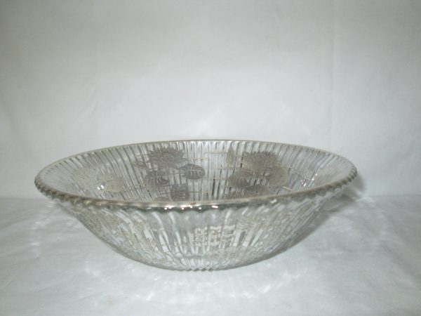 Beautiful Ribbed Glass Bowl with Sterling Silver Applied to the inside of the bowl Lily pads and flowers sterling rim