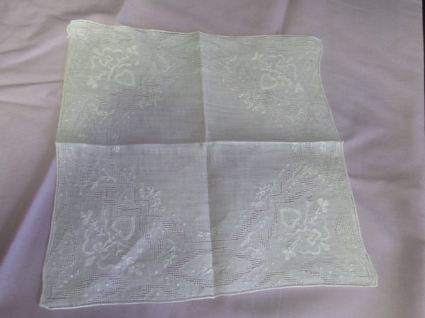 Beautiful white on white hankie embroidered appliquéd with lace pattern
