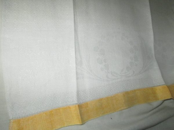 Cotton Tea Towel Damask Lily of the Valley at bottom Diamonds at top Yellow trim both ends Hemstitched