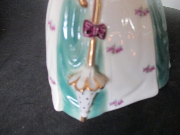 Miss Kitty Porcelain Woman figurine Raymond Turner Goldcrest Creation #1245 U.S.A.  Green black and white purple flowers display collectible