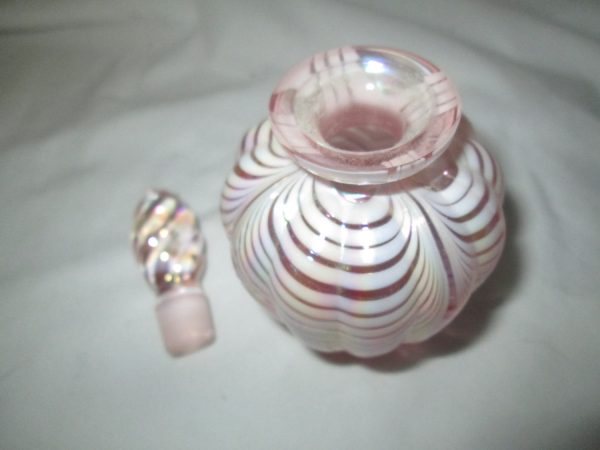 Vintage Art Glass perfume bottle with ground glass stopper Pink with white swirl pattern iridescent vanity dresser jar hand crafted