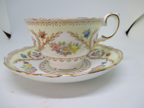 Vintage English Fine bone China Tea cup and saucer Crown Staffordshire Floral pale yellow & brown collectible display cottage farmhouse