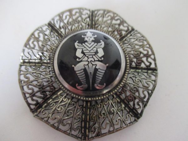 Vintage Siam pin brooch silver tone with silver siam warrior on black stone early mid century
