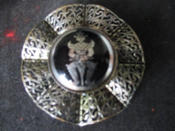 Vintage Siam pin brooch silver tone with silver siam warrior on black stone early mid century