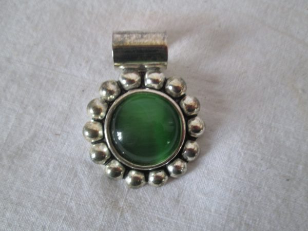 Vintage sterling silver necklace drop with green cat eye style stone center