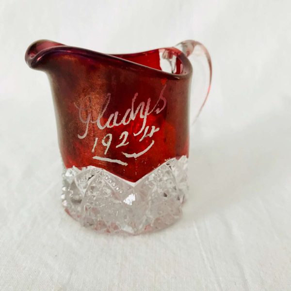1924 - United States New York City, United States Souvenir cut glass cream pitcher miniature with red top Gladys etched