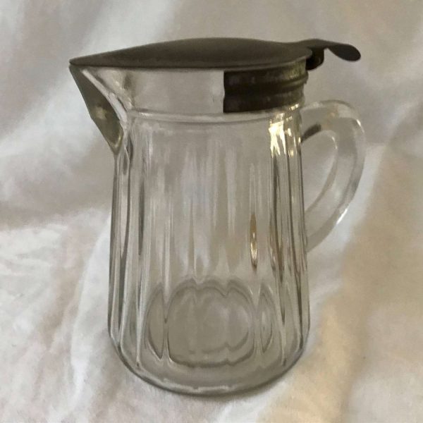 Antique Glass Syrup Pitcher with metal push lid turn of the century farmhouse collectible display table top dining decor holiday serving