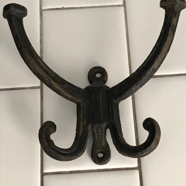 Antique hook cast iron wall hook collectible display farmhouse cabin lodge rustic decor coats hats backpacks towels