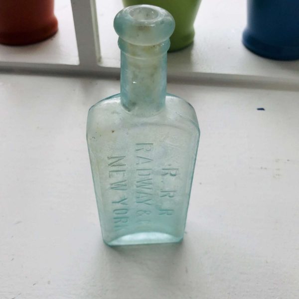 Antique Pharmacy Apothecary Medical Bottle Iridescent Blue Pharmaceutical Doctor Medicine bottle collectible display R.R.R. Radway New York