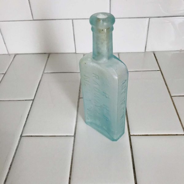 Antique Pharmacy Apothecary Medical Bottle Iridescent Blue Pharmaceutical Doctor Medicine bottle collectible display R.R.R. Radway New York