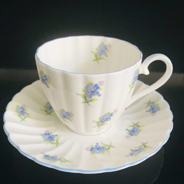 Antique Royal Tuscan tea cup and saucer England Fine bone china Chintz blue floral bouquets gold trim farmhouse collectible display dining