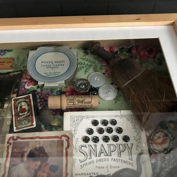 Antique Sewing Shadow box Singer Staff in front of storee photo sewing notions snaps needles spools and more Antique items
