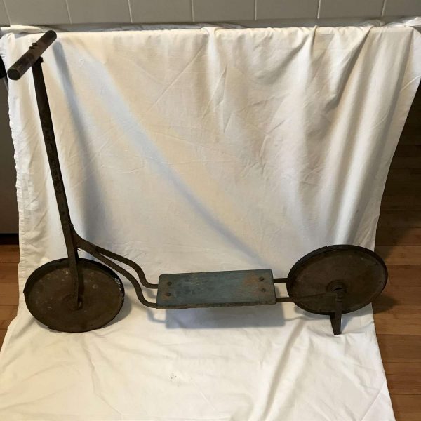 Antique Wooden Scooter Primitive collectible display farmhouse cabin lodge Movie TV Prop rubber wheels wood base wooden handle bars metal