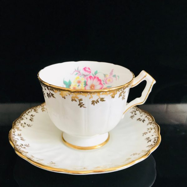 Aynsley Tea Cup and Saucer Fine bone china England White with gold garland rims Pink yellow orange bouquet inside Collectible Display bridal