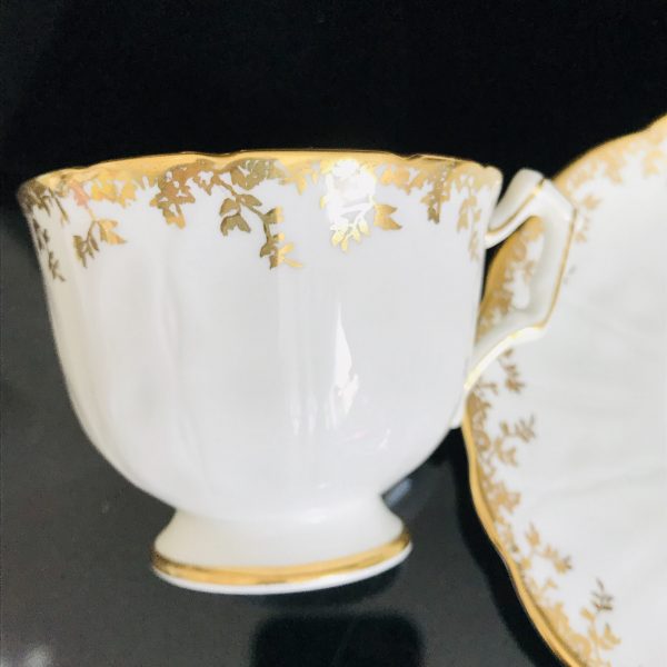 Aynsley Tea Cup and Saucer Fine bone china England White with gold garland rims Pink yellow orange bouquet inside Collectible Display bridal