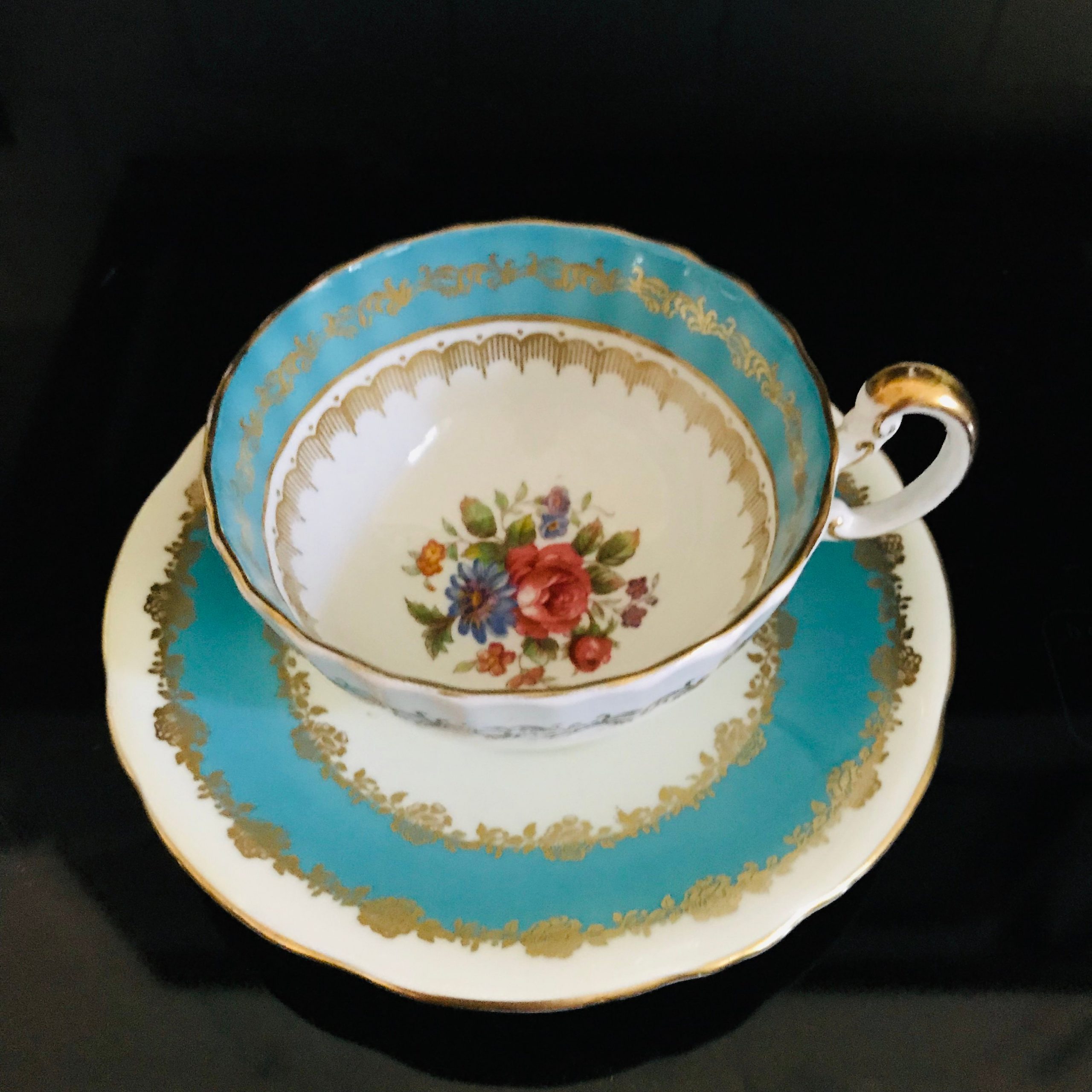 Aynsley Tea Cup And Saucer Turquoise Blue Floral Center Pattern Fine Bone China England