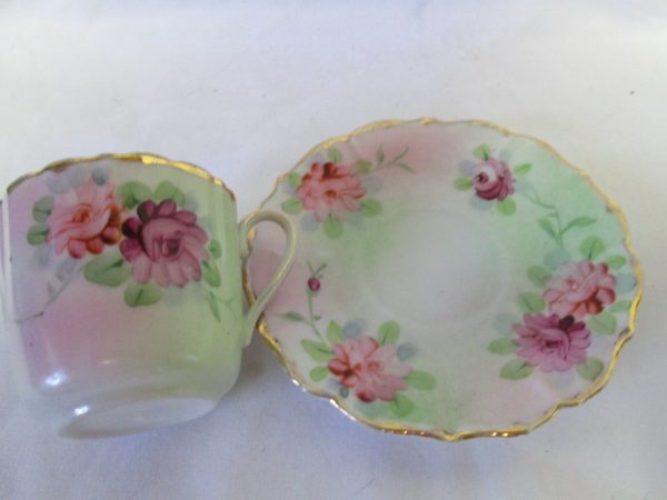 Beautiful Demitasse tea cup and saucer pink roses green leaves gold trim scalloped rims