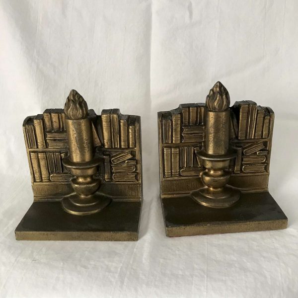 Brass book and candle bookends detailed collectible display farmhouse cabin study library antique home decor