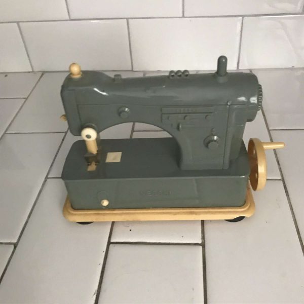 Child size Necchi little miss seamstress sewing machine gray & ivory hand crank plastic machine with cardboard box USA