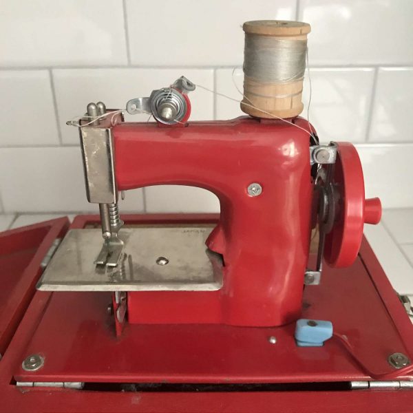 Child size Red Japan sewing machine metal original 1930's hand crank or battery operated In Original Case collectible display