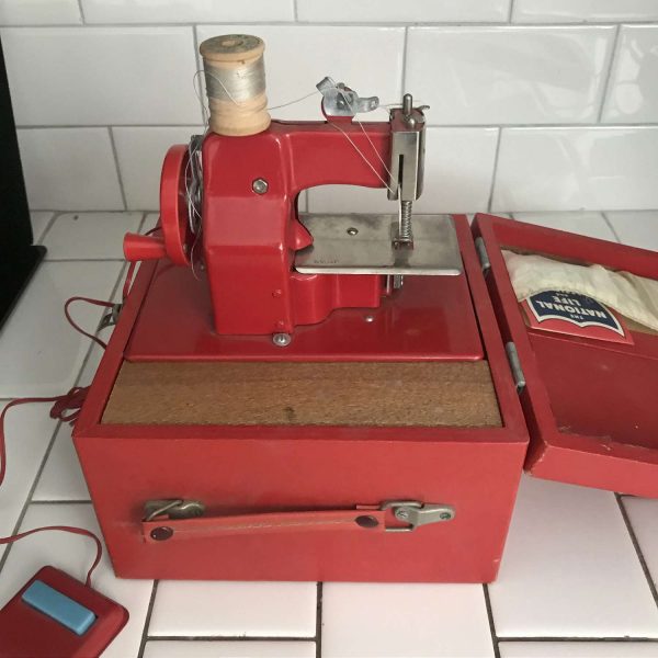 Child size Red Japan sewing machine metal original 1930's hand crank or battery operated In Original Case collectible display