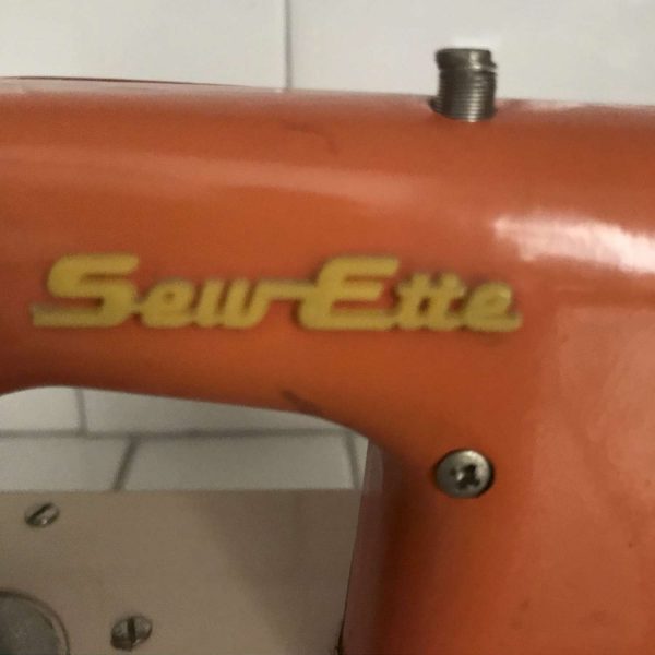 Child size SewEtte Orange and beige sewing machine hand crank & Battery operated Japan Metal 1940's collectible display all metal