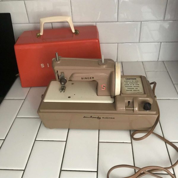 Child size Singer electric sewing machine Beige & orange metal original 1950's Sewhandy Original Case Great Britain