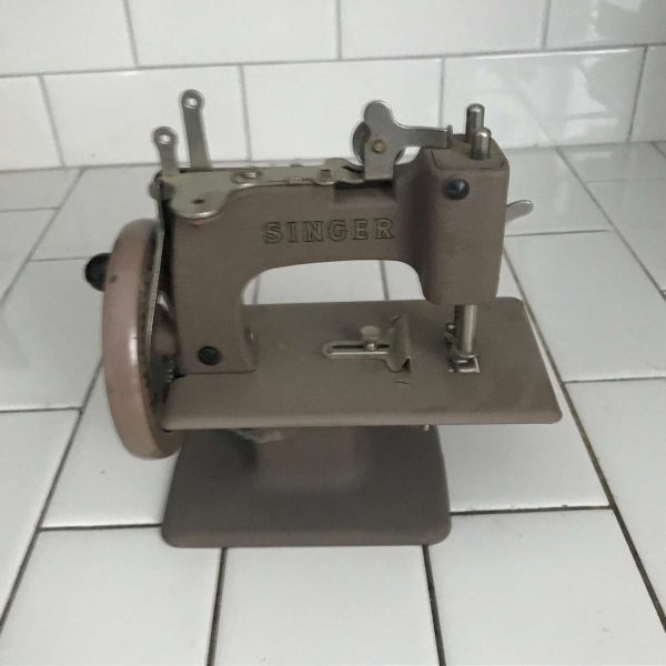 Child size Singer sewing machine Taupe Color Gold Seal metal original 1930's hand crank All Metal collectible display