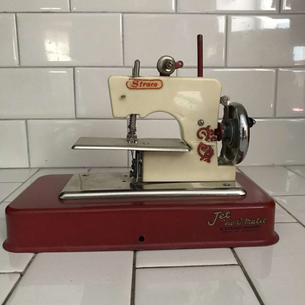 Child size Straco Jet Sew-O-Matic Red and Ivory sewing machine hand crank England Metal 1940's collectible display