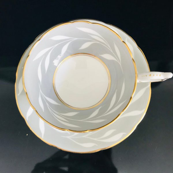 Coalport tea cup and saucer England Fine bone china tree slight gray with wispy white leaves pattern gold trim farmhouse collectible display