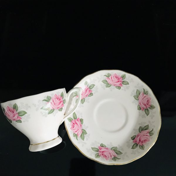 Colclough tea cup and saucer England Fine bone china Pink Rose on pink background white inside farmhouse collectible display coffee