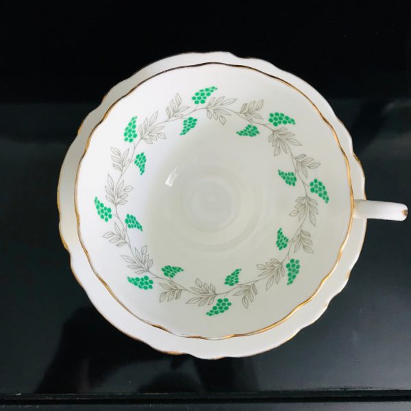 Crown Staffordshire tea cup and saucer England Fine bone china Bright green Berries gray leaves gold trim farmhouse collectible display