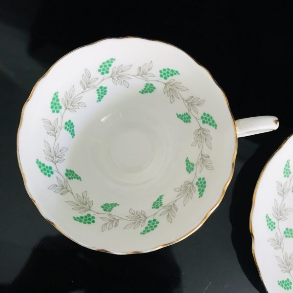 Crown Staffordshire tea cup and saucer England Fine bone china Bright green Berries gray leaves gold trim farmhouse collectible display