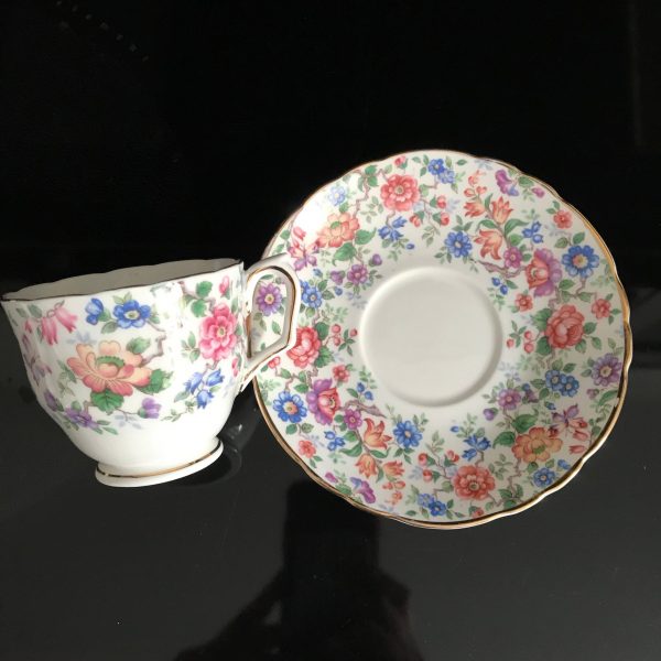 Crown Staffordshire tea cup and saucer England Fine bone china Pink purple blue flowers Chintz farmhouse collectible display coffee bridal