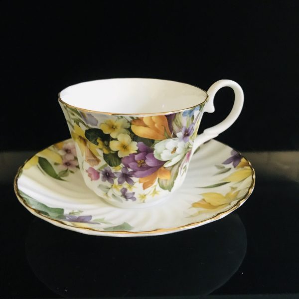 Crownford Tea cup and saucer England Fine bone china Floral crocus daffodils daisies purple yellow farmhouse collectible display serving