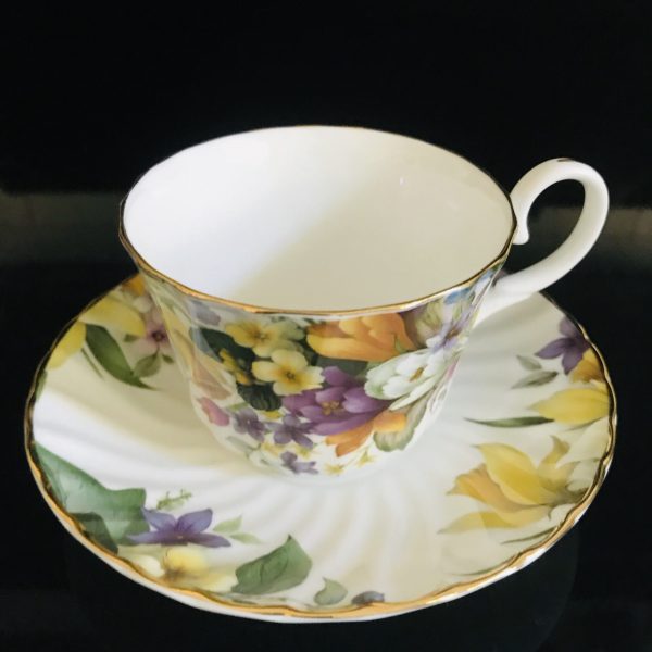 Crownford Tea cup and saucer England Fine bone china Floral crocus daffodils daisies purple yellow farmhouse collectible display serving
