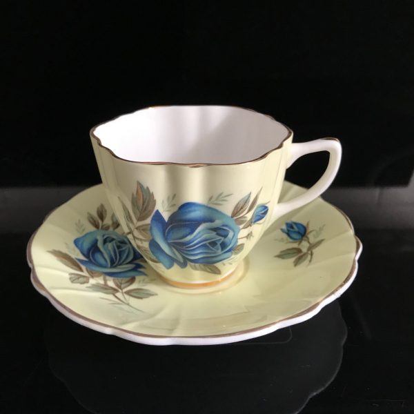 Crownford Tea cup and saucer England Fine bone china Yellow with a Large Blue Rose & a blue rose bud farmhouse collectible display serving