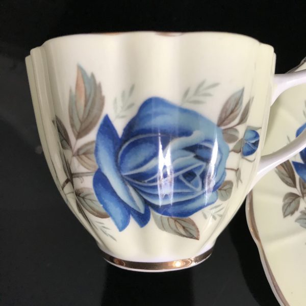 Crownford Tea cup and saucer England Fine bone china Yellow with a Large Blue Rose & a blue rose bud farmhouse collectible display serving
