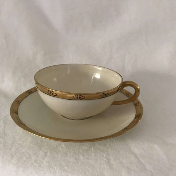 Dainty Limoge France Demitasse Tea cup and Saucer Heavy Gold trim display collectible entertaining dining tea coffee
