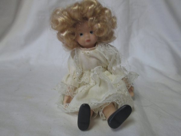 Darling little porcelain doll collectible miniature doll
