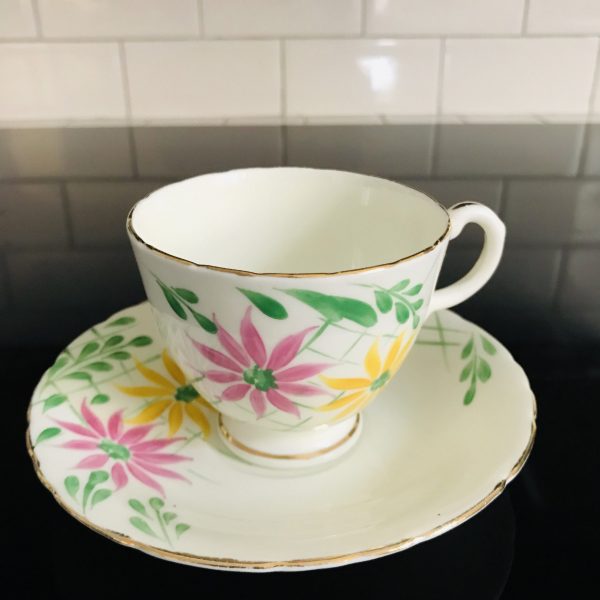 Delphine Tea cup and saucer England Fine bone china Pink & yellow flowers green lattice farmhouse collectible display serving