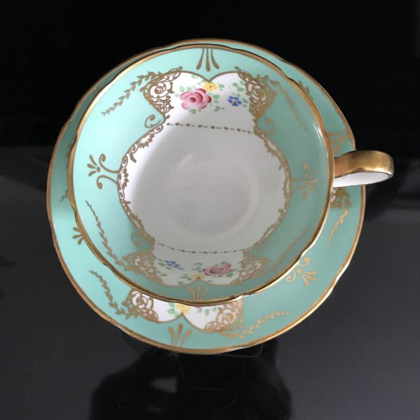 Gladstone England Tea cup and saucer dainty flowers green trim with cabbage rose heavy gold Fine bone china farmhouse collectible display